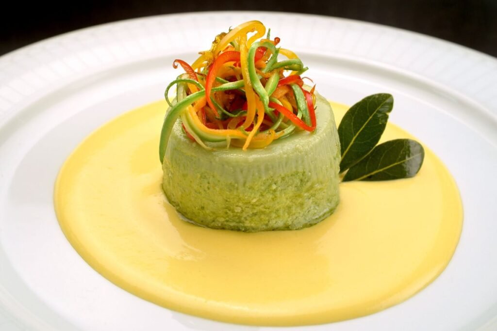 Sformatino di carciofi con fonduta di Castelmagno e nocciole tostate